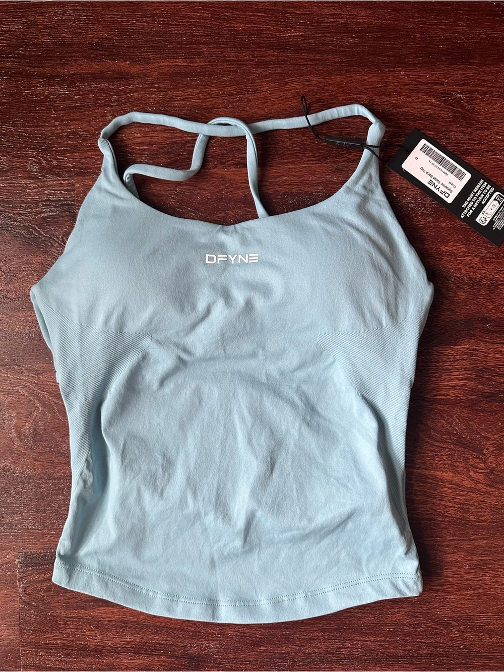 DFYNE Dynamic twist back top color Coast NWT